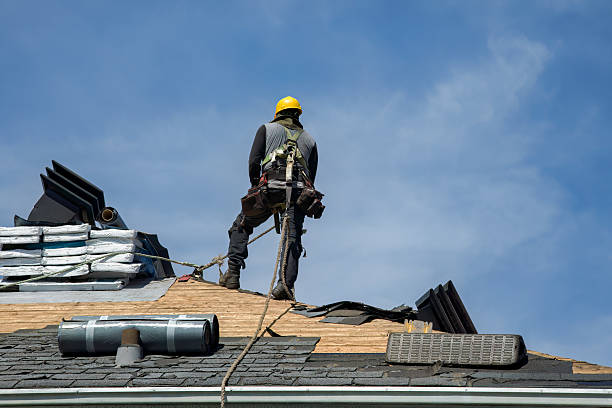 Professional Gutter Installation technician working in Woodstock, MD